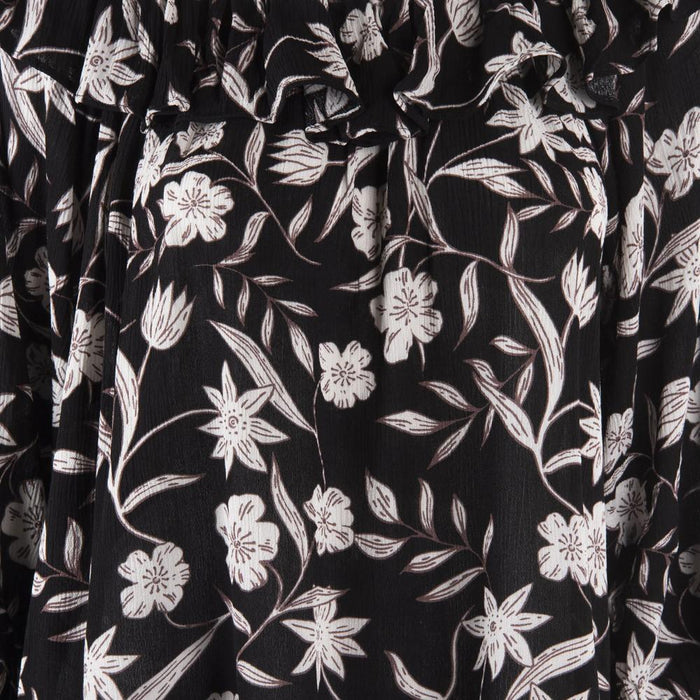 Blusa Negra Flores Blancas Reef