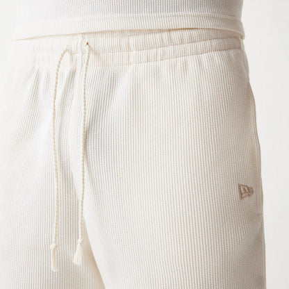 The Male model is wearing Boston Celtics NBA Waffle Open White Shorts 5