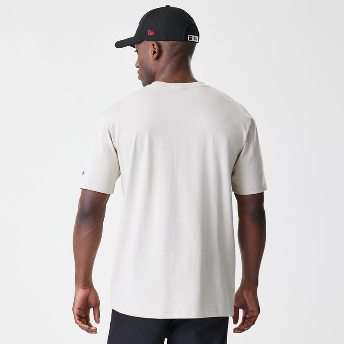 The Male model is wearing Chicago Bulls Modern Driver Light Beige T-Shirt 2