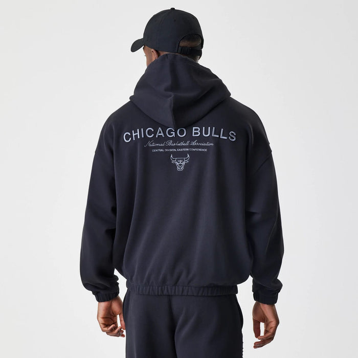The Male model is wearing Chicago Bulls NBA Linear Black Oversized Full Zip Hoodie 2