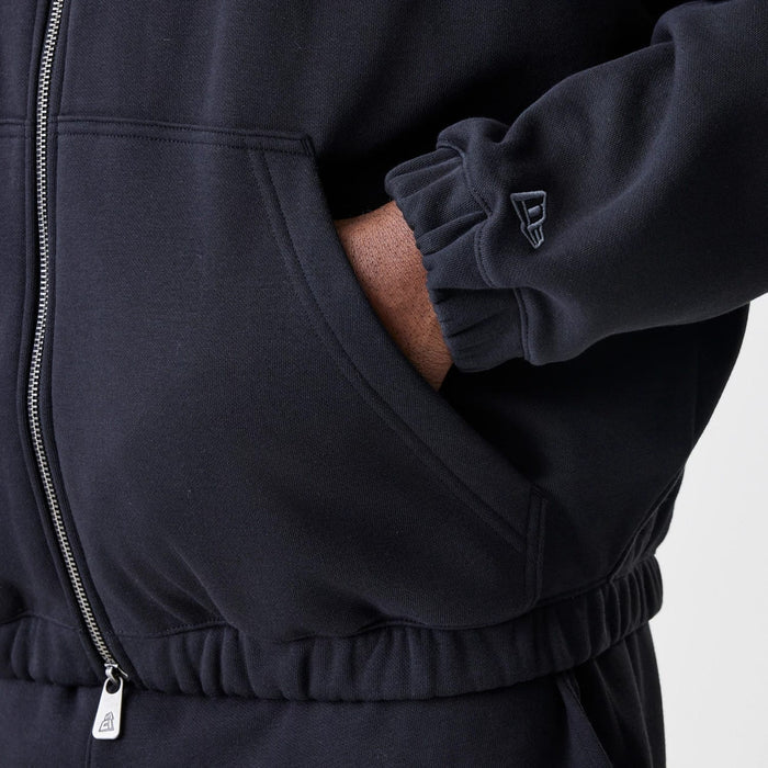 The Male model is wearing Chicago Bulls NBA Linear Black Oversized Full Zip Hoodie 5