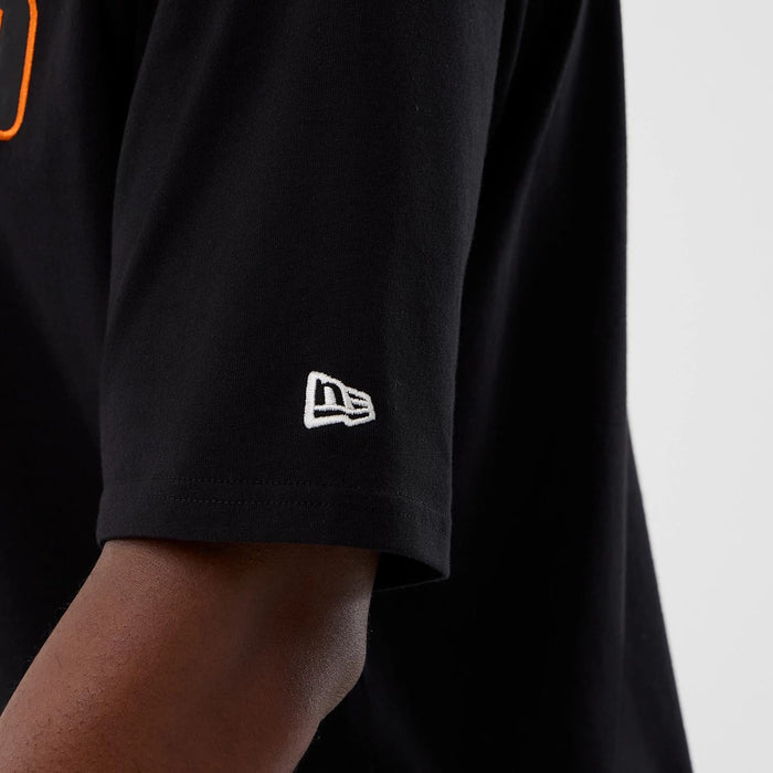 The Male model is wearing Cleveland Browns NFL International Series Games Black Oversized T-Shirt 5