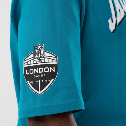 The Male model is wearing Jacksonville Jaguars NFL International Series Games Turquoise Oversized T-Shirt 3