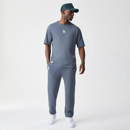The Male model is wearing LA Dodgers MLB Midi League Essential Dark Grey Joggers 8