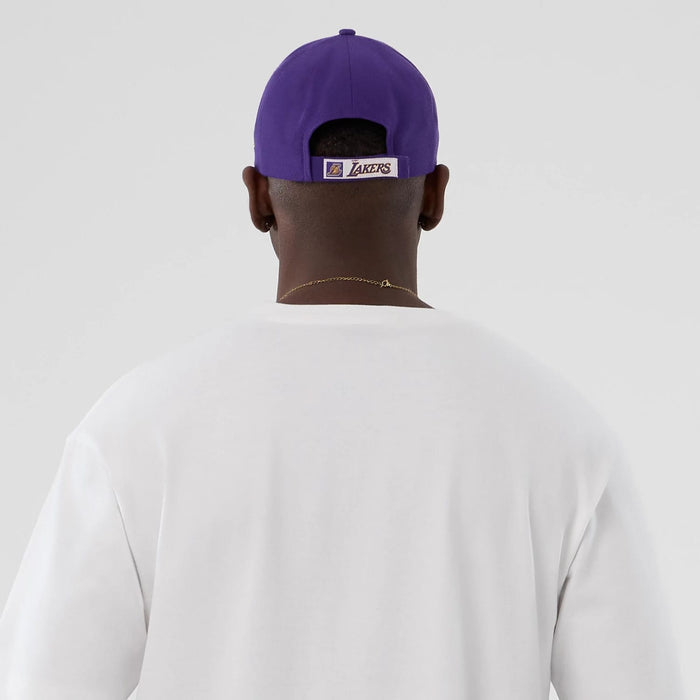 The Male model is wearing LA Lakers NBA Lifestyle Graphic White T-Shirt 6