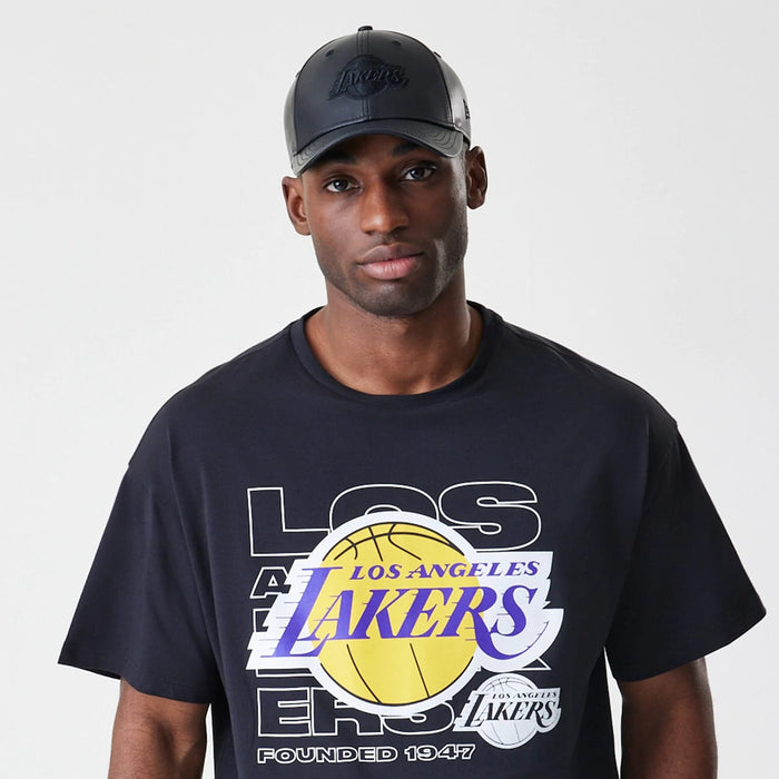 The Male model is wearing LA Lakers NBA Outline Graphic Navy Oversized T-Shirt 6