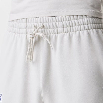 The Male model is wearing LA Lakers NBA Piping Cream Joggers 5