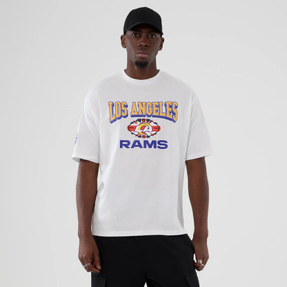 The Male model is wearing LA Rams NFL International Series Games 2025 White Oversized T-Shirt 1