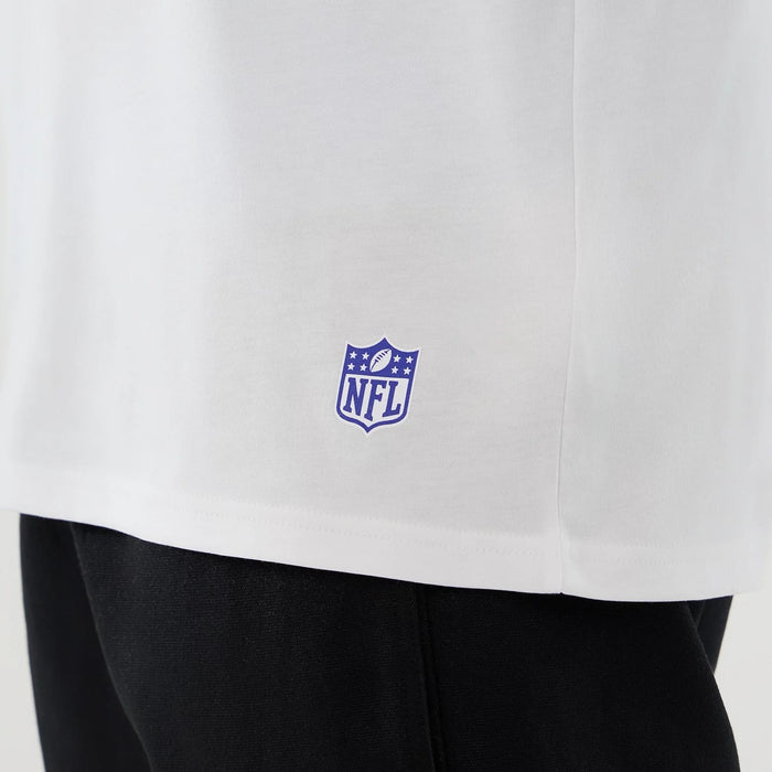 The Male model is wearing LA Rams NFL International Series Games 2025 White Oversized T-Shirt 5