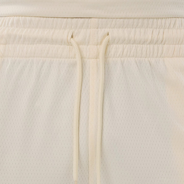The model is wearing these NFL Historic Las Vegas Raiders shorts in cream. 6