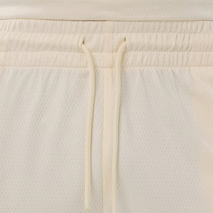 The model is wearing these NFL Historic Las Vegas Raiders shorts in cream. 6