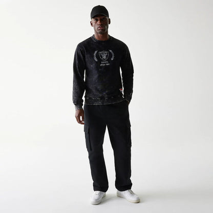 The Male model is wearing Las Vegas Raiders NFL Throwback Black Crew Neck Sweater 6