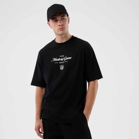 The Male model is wearing Madrid Game NFL International Series Games Black Oversized T-Shirt 1