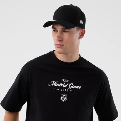 The Male model is wearing Madrid Game NFL International Series Games Black Oversized T-Shirt 6