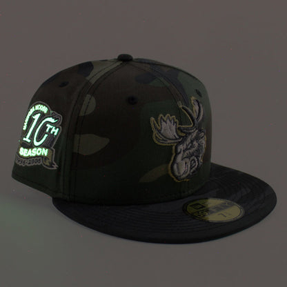 MANITOBA MOOSE 10TH SEASON AMERICAN HOCKEY LEAGUE New Era 59Fifty Fitted Hat (WoodLand Camo Black Green Under Brim)