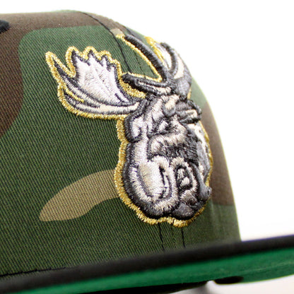 MANITOBA MOOSE 10TH SEASON AMERICAN HOCKEY LEAGUE New Era 59Fifty Fitted Hat (WoodLand Camo Black Green Under Brim)