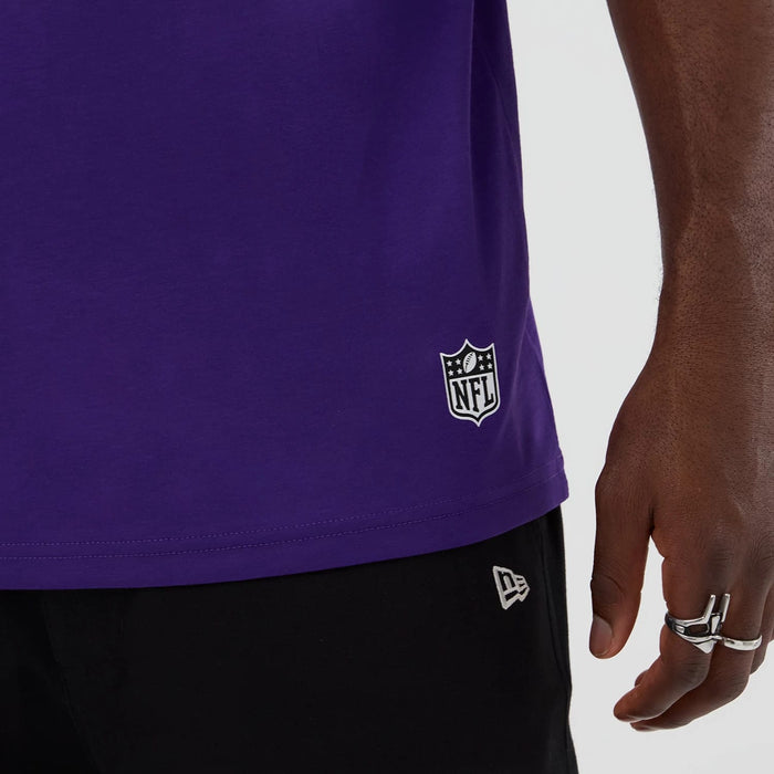 The Male model is wearing Minnesota Vikings NFL International Series Games 2025 Purple Oversized T-Shirt 5