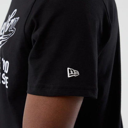 The Male model is wearing  New Era Back To School Black T-Shirt 5
