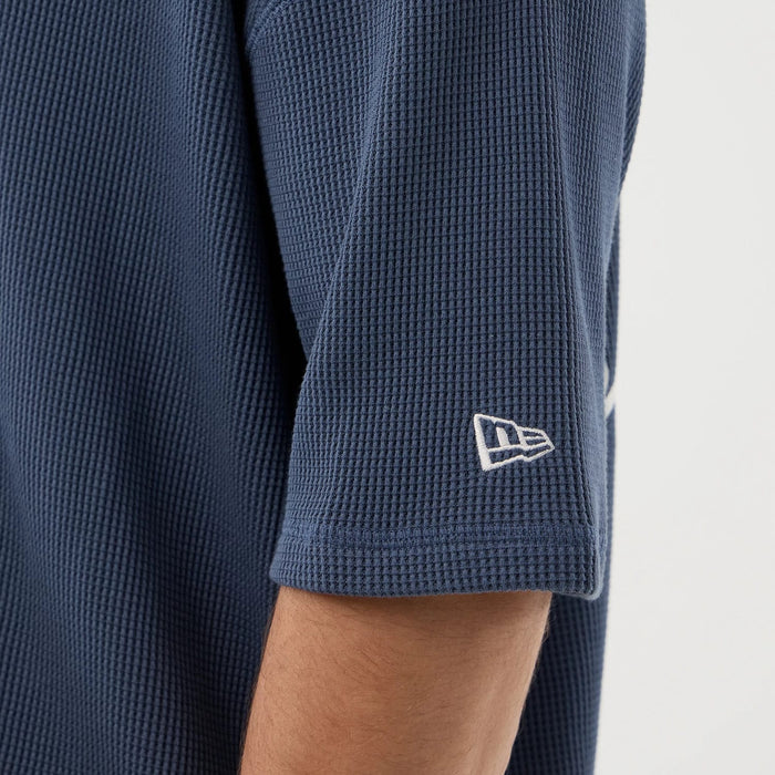 The Male model is wearing New Era Basic Blue T-Shirt 4