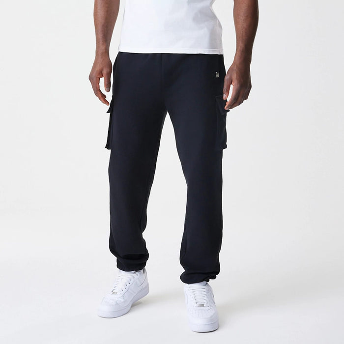The Male model is wearing  New Era Cargo Black Joggers 3
