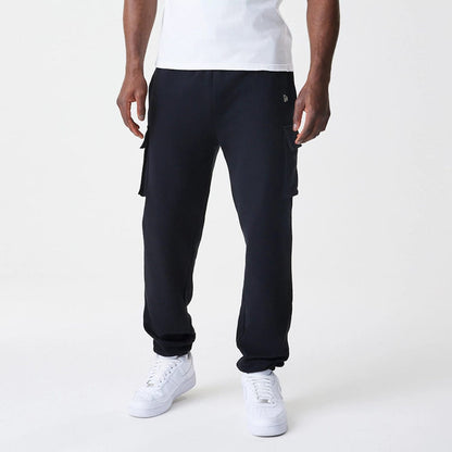The Male model is wearing  New Era Cargo Black Joggers 3