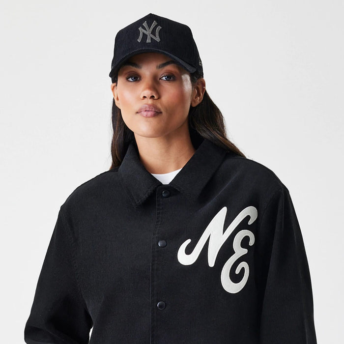 The Male model is wearing  New Era Cord Black Coaches Jacket 5