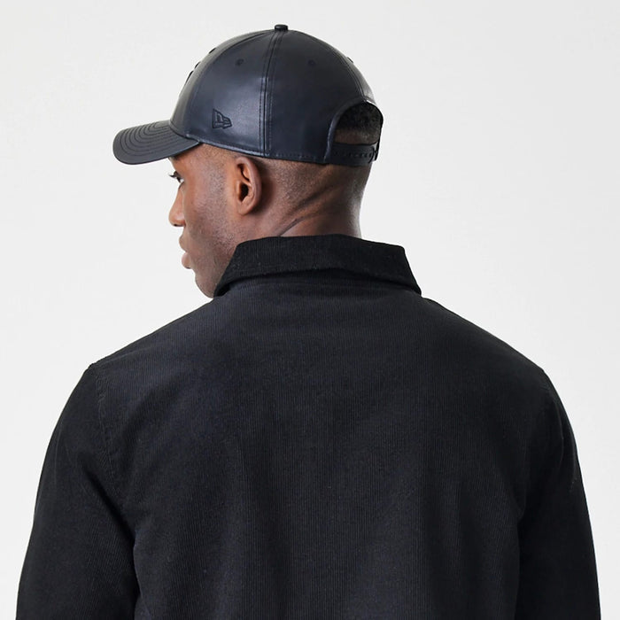 The Male model is wearing  New Era Cord Black Coaches Jacket 8