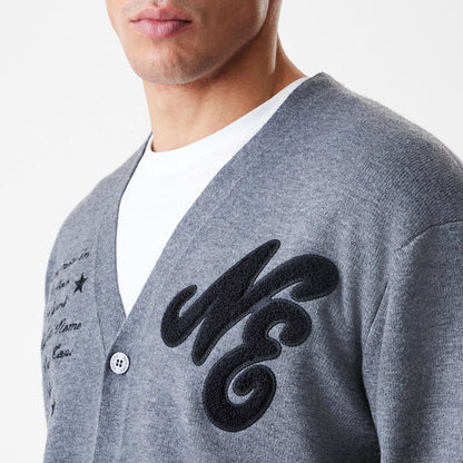 The Male model is wearing  New Era Dark Grey Cardigan 8
