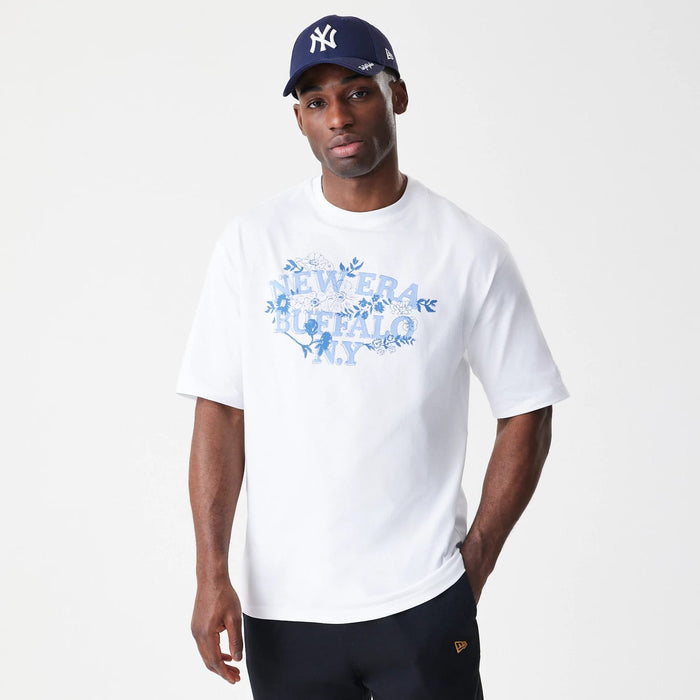 The Male model is wearing  New Era Floral White Oversized T-Shirt 3