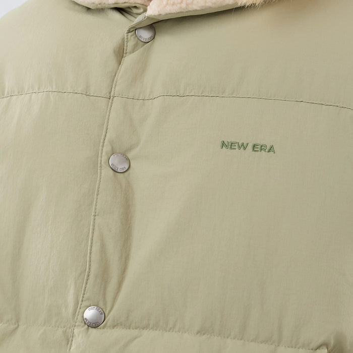 The Male model is wearing  New Era Organic Boa Neck Khaki Gilet 5
