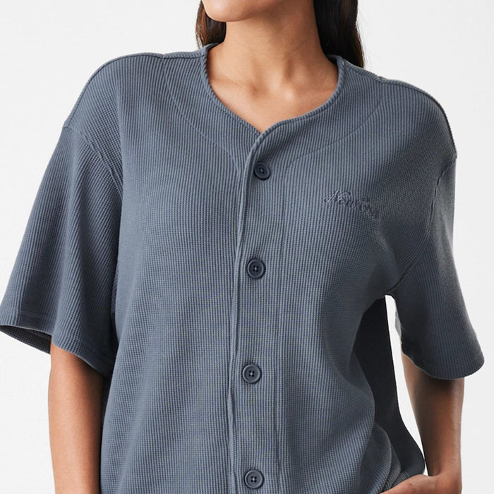 The Male model is wearing  New Era Waffle Dark Grey Jersey 7
