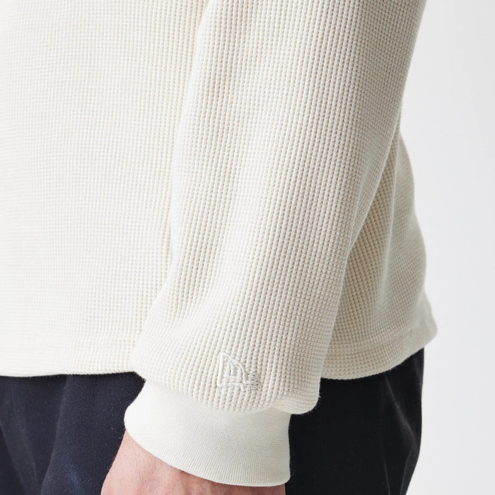 The Male model is wearing  New Era Waffle Light Beige Long Sleeve T-Shirt 5