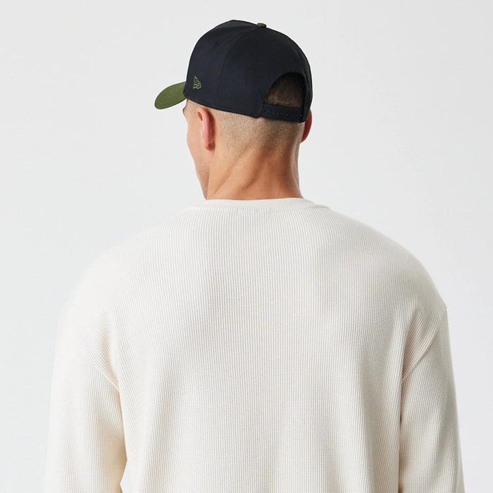 The Male model is wearing  New Era Waffle Light Beige Long Sleeve T-Shirt 7