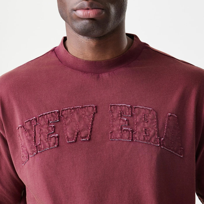 The Male model is wearing  New Era Washed Dark Red Oversized T-Shirt 5