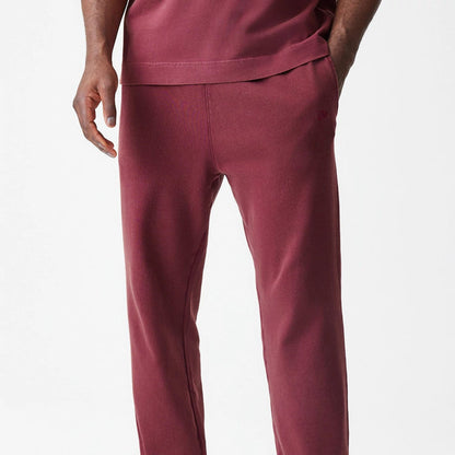 The Male model is wearing  New Era Washed Dark Red Straight Leg Joggers 4