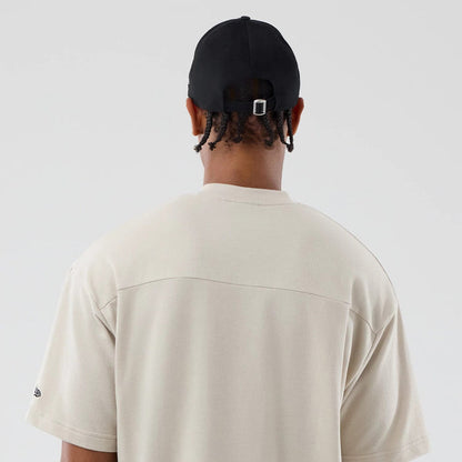 The Male model is wearing New York Giants NFL Throwback Prep Light Beige T-Shirt 7