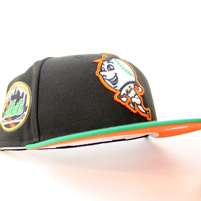 New York Mets Mets Skyline New Era 59Fifty Fitted Hat (GITD Black Kelly Green Orange Under Brim)