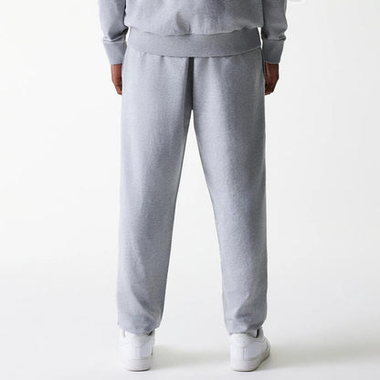 The Male model is wearing New York Yankees MLB League Essential Midi Grey Joggers 2