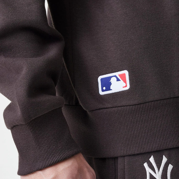 The Male model is wearing New York Yankees MLB Midi League Essential Dark Brown Oversized Crew Neck Sweater 6