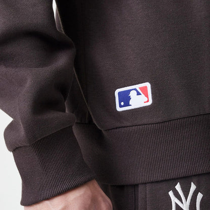 The Male model is wearing New York Yankees MLB Midi League Essential Dark Brown Oversized Crew Neck Sweater 6
