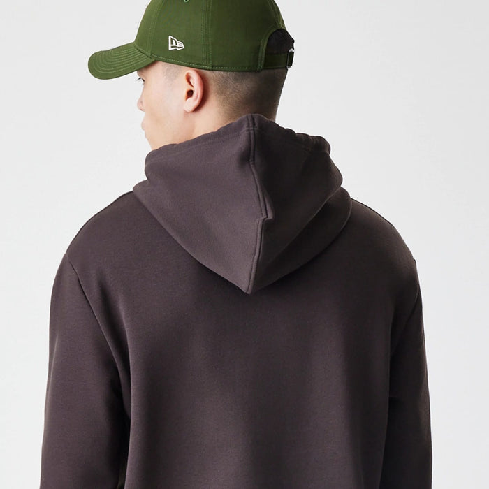 The Male model is wearing New York Yankees MLB Midi League Essential Dark Brown Oversized Pullover Hoodie 4