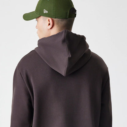 The Male model is wearing New York Yankees MLB Midi League Essential Dark Brown Oversized Pullover Hoodie 4