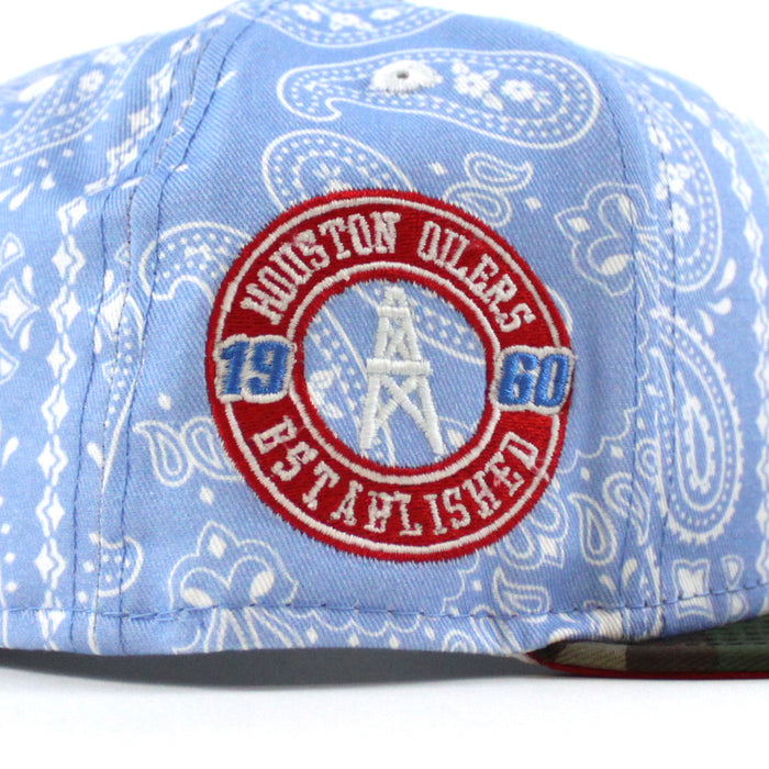 🚨PRE-ORDER🚨 HOUSTON OILERS New Era 59Fifty Fitted Hat (Sky Blue Paisley WoodLand Camo Red Under Brim) 07262023