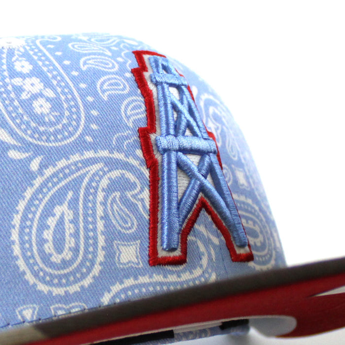 🚨PRE-ORDER🚨 HOUSTON OILERS New Era 59Fifty Fitted Hat (Sky Blue Paisley WoodLand Camo Red Under Brim) 07262023