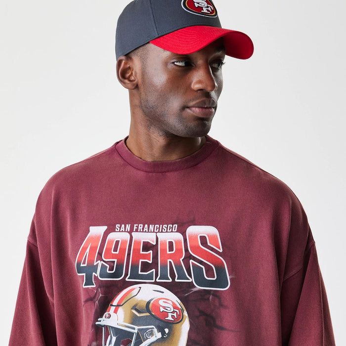 The Male model is wearing San Francisco 49ers NFL Washed Boxy Dark Red Oversized Crew Neck Sweater 6