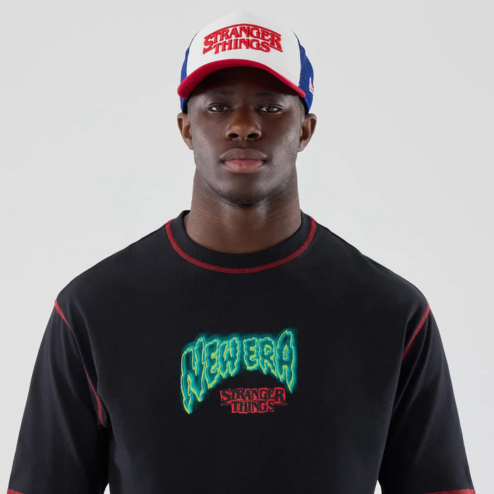 The Male model is wearing Stranger Things Black Oversized T-Shirt 7