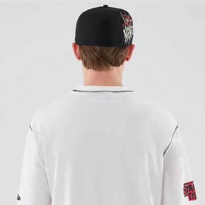 The Male model is wearing Stranger Things White Oversized T-Shirt 7